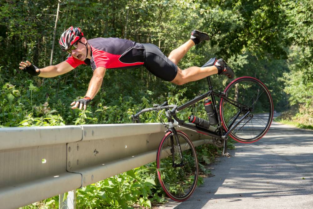 bicycle accident when falling through road barriers